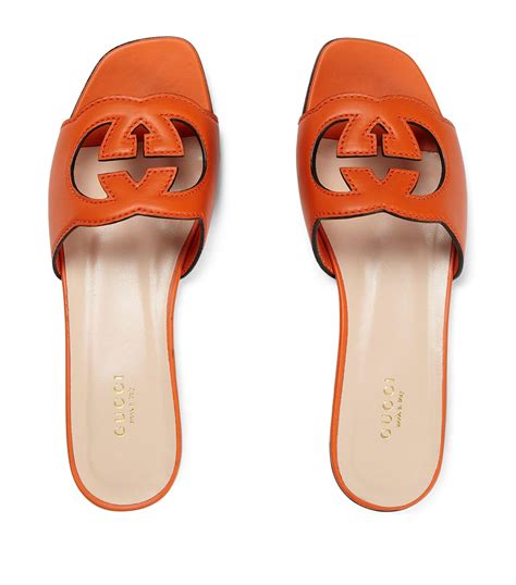 gucci orange flat boots